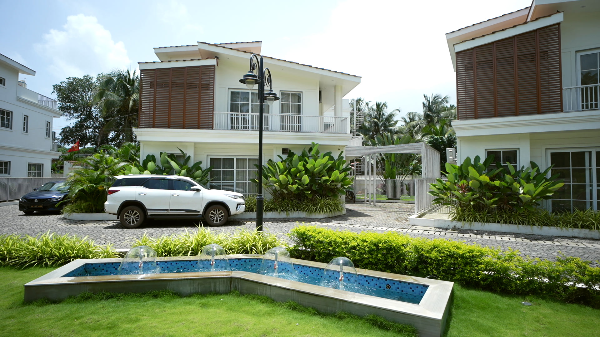 The water garden in front of the villas at La Mandre