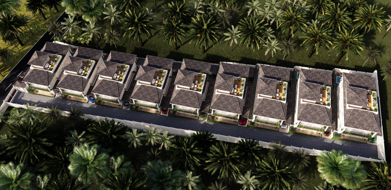 Aerial view of the nine La Serein villas in a row along a private road, backed by palms
